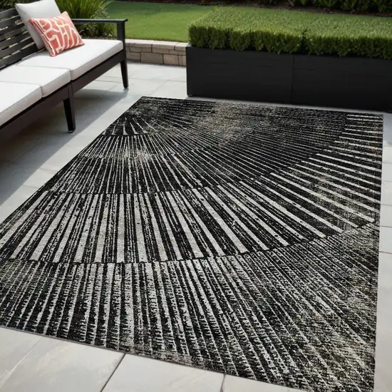 Black and Ivory Abstract Washable Non Skid Indoor Outdoor Area Rug Photo 1