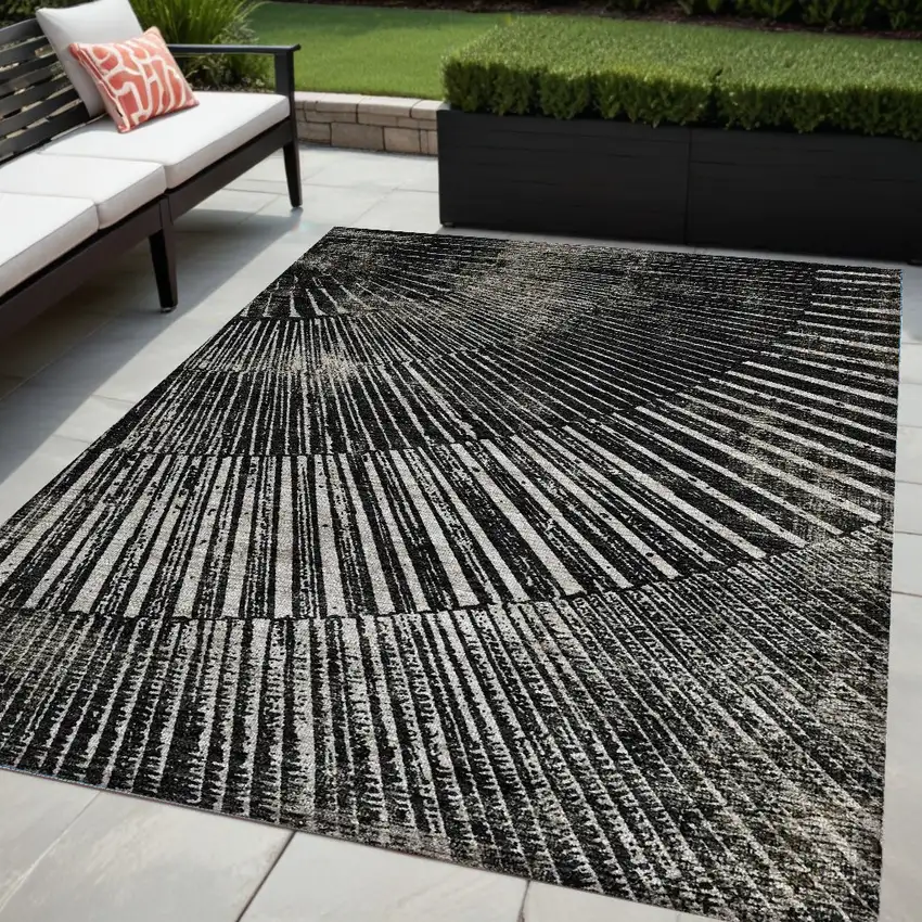 Black and Ivory Abstract Washable Non Skid Indoor Outdoor Area Rug Photo 1