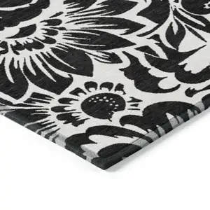 Photo of Black and Ivory Floral Washable Non Skid Indoor Outdoor Area Rug