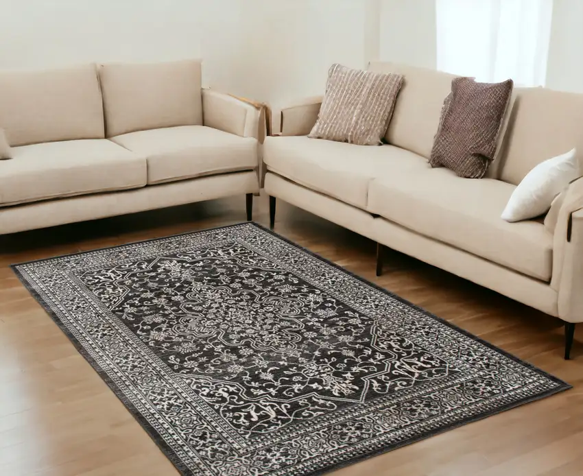 Black and Ivory Oriental Distressed Area Rug Photo 1