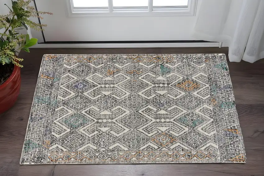 Black and Ivory Wool Chevron Hand Tufted Distressed Area Rug Photo 1