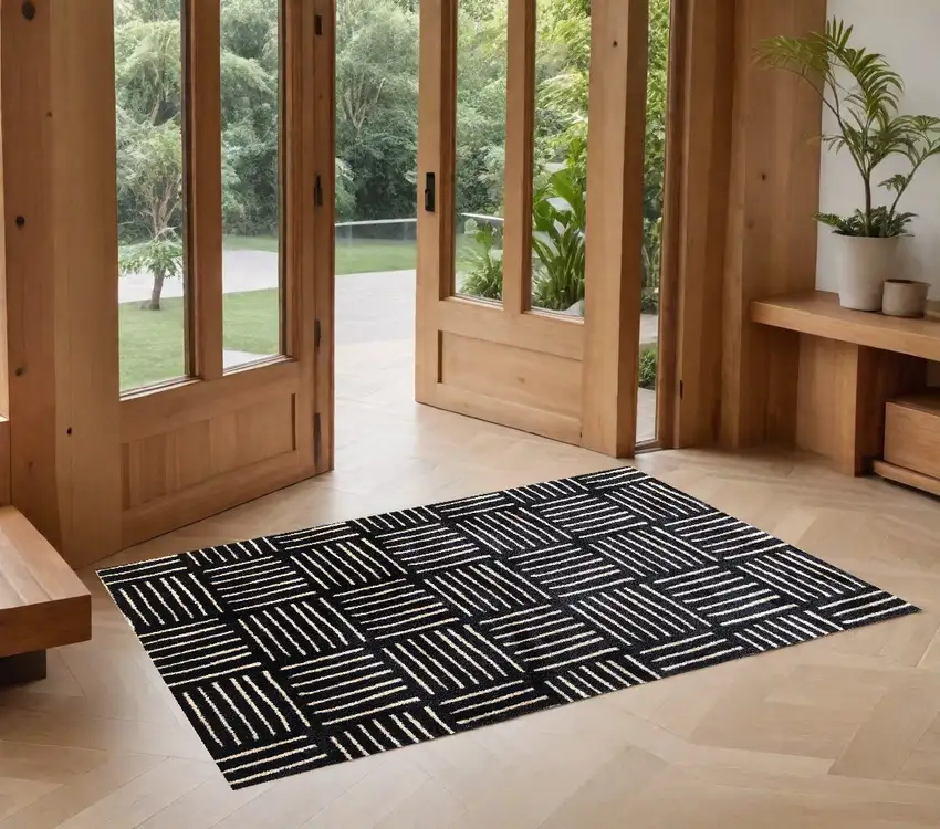 Black and Off White Abstract Machine Tufted Washable Area Rug With UV Protection Photo 1