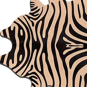 Photo of Black and Tan Zebra Print Genuine Cowhide Area Rug