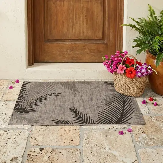 Black and Taupe Palm Leaf Stain Resistant Indoor Outdoor Area Rug Photo 1