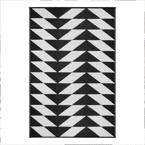 Black and White Geometric Machine Braided Distressed Area Rug With UV Protection Photo 2