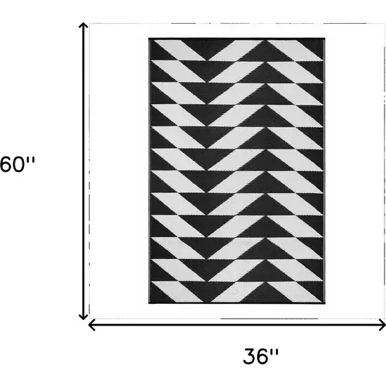 Black and White Geometric Machine Braided Distressed Area Rug With UV Protection Photo 3