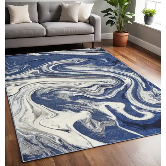Blue And Beige Abstract Area Rug Photo 1