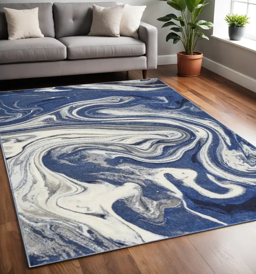 Blue And Beige Abstract Area Rug Photo 1