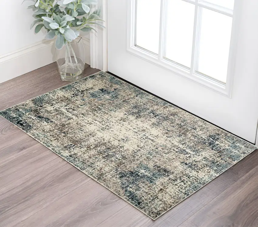 Ivory Blue and Gray Abstract Power Loom Area Rug Photo 1