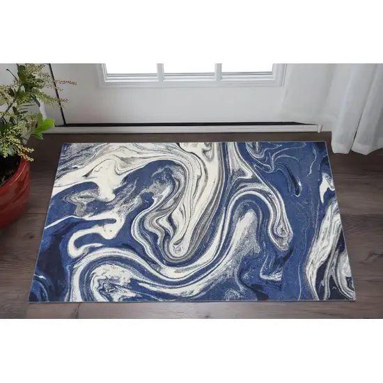 Blue And Beige Abstract Area Rug Photo 1