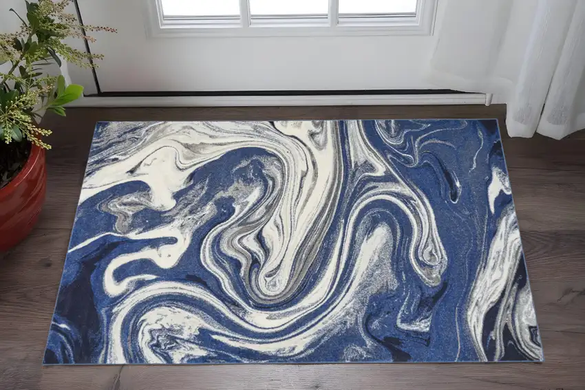 Blue And Beige Abstract Area Rug Photo 1