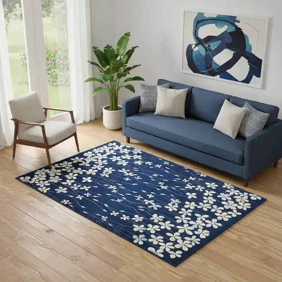 Blue And Beige Floral Area Rug Photo 1