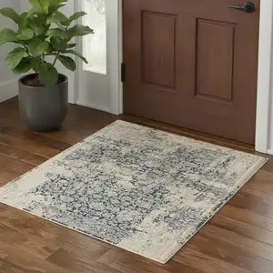 Photo of Blue And Beige Floral Square Rug