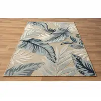 Photo of Blue And Beige Floral Stain Resistant Indoor Outdoor Area Rug