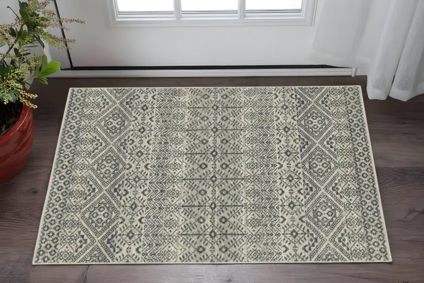 Blue And Beige Geometric Power Loom Stain Resistant Area Rug Photo 1