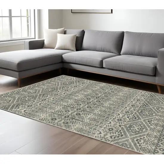 Blue And Beige Geometric Power Loom Stain Resistant Area Rug Photo 1