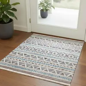 Photo of Blue And Beige Jute Geometric Hand Woven Square Rug