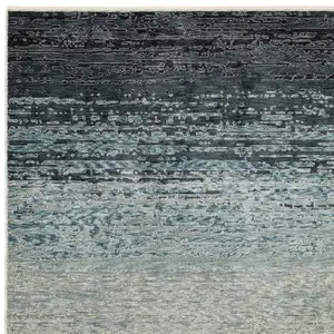 Photo of Blue And Beige Ombre Area Rug With Fringe