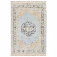 Photo of Blue And Beige Oriental Hand Loomed Stain Resistant Area Rug With Fringe