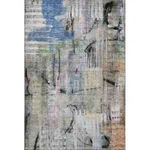 Photo of Blue And Black Abstract Washable Area Rug With UV Protection