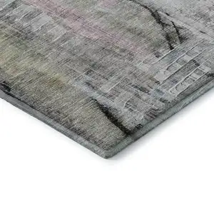 Photo of Blue And Black Abstract Washable Area Rug With UV Protection