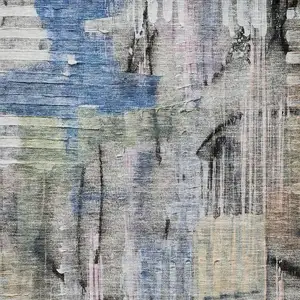 Photo of Blue And Black Abstract Washable Area Rug With UV Protection