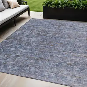 Photo of Blue And Brown Ikat Washable Indoor Outdoor Area Rug