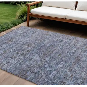 Photo of Blue And Brown Ikat Washable Indoor Outdoor Area Rug