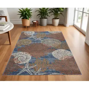 Photo of Blue And Brown Seashell and Coral Non Skid Area Rug