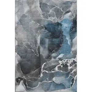 Photo of Blue And Charcoal Abstract Washable Area Rug With UV Protection