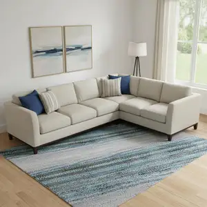 Photo of Blue And Charcoal Abstract Washable Area Rug With UV Protection