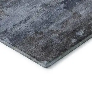 Photo of Blue And Charcoal Abstract Washable Area Rug With UV Protection