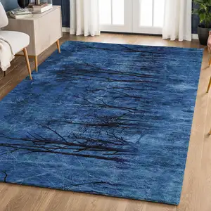 Photo of Blue And Charcoal Floral Washable Area Rug With UV Protection