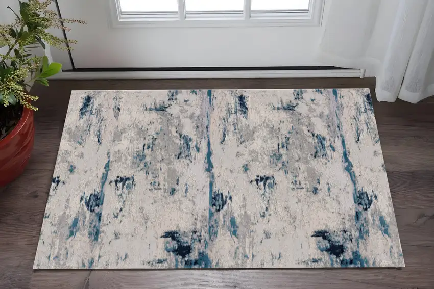 Blue And Cream Abstract Area Rug Photo 1