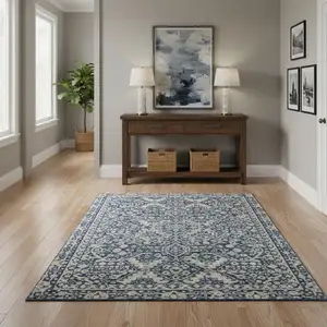 Photo of Blue And Cream Floral Area Rug With Fringe
