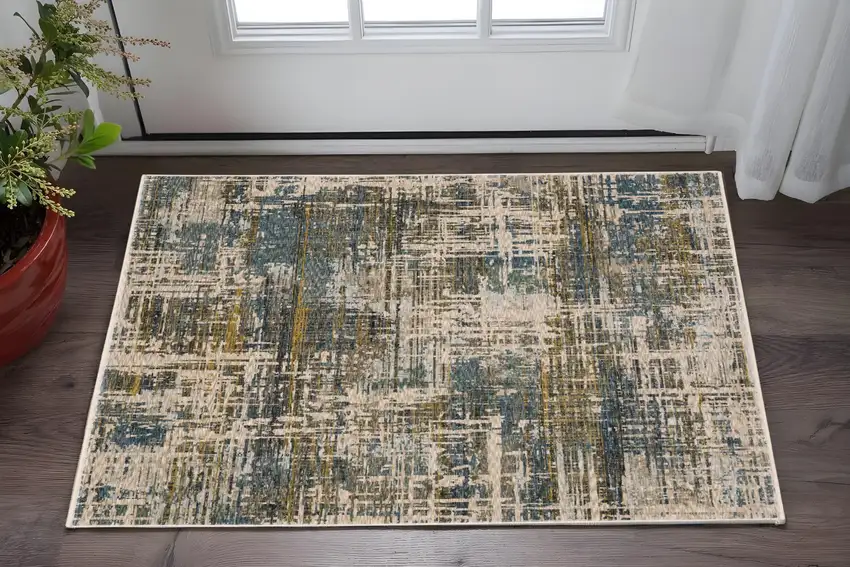 Blue And Gold Abstract Area Rug With Fringe Photo 1