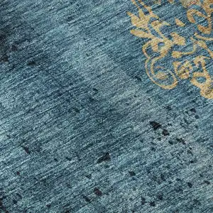 Photo of Blue And Gold Floral Washable Area Rug With UV Protection