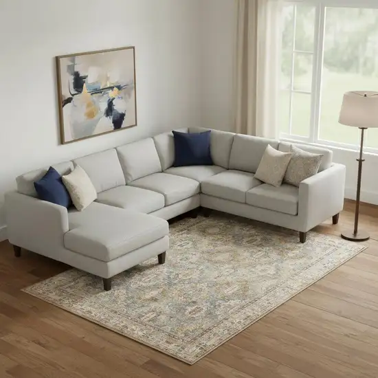 Blue And Gold Geometric Distressed Area Rug Photo 1