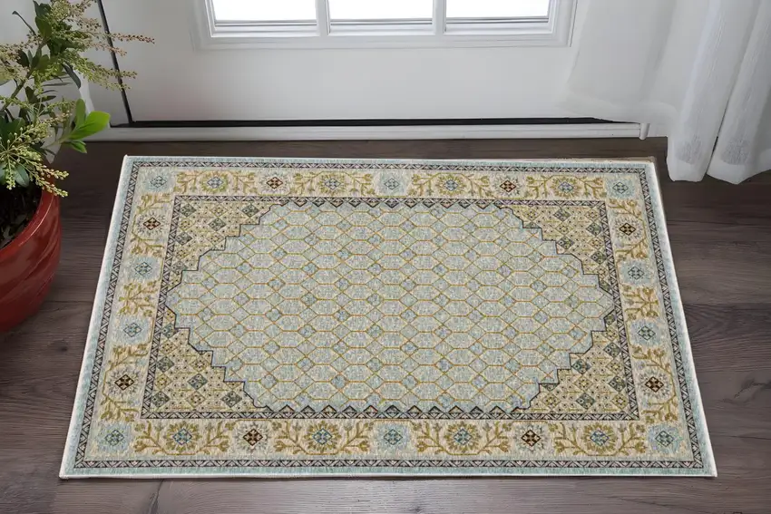 Blue And Gold Oriental Area Rug With Fringe Photo 1