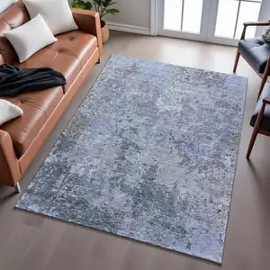 Photo of Blue And Gray Abstract Washable Area Rug With UV Protection