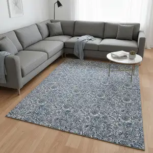 Photo of Blue And Gray Floral Washable Area Rug With UV Protection