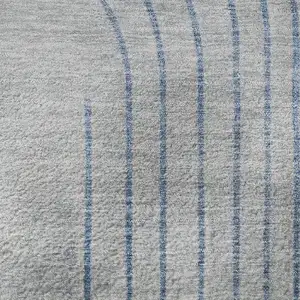 Photo of Blue And Gray Geometric Washable Area Rug With UV Protection