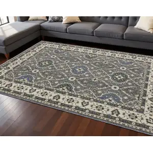 Photo of Blue And Gray Oriental Area Rug With Fringe