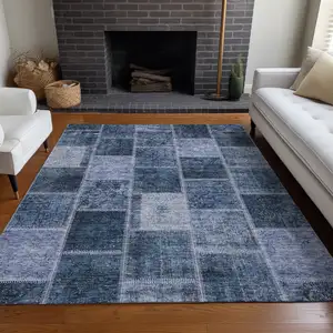 Photo of Blue And Gray Patchwork Washable Area Rug With UV Protection