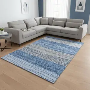Photo of Blue And Gray Striped Washable Area Rug With UV Protection