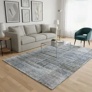 Photo of Blue And Gray Striped Washable Area Rug With UV Protection