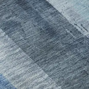 Photo of Blue And Gray Striped Washable Area Rug With UV Protection