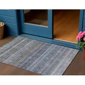 Photo of Blue And Gray Striped Washable Indoor Outdoor Area Rug