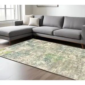 Photo of Blue And Green Abstract Hand Loomed Stain Resistant Area Rug