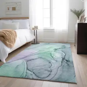 Photo of Blue And Green Abstract Washable Area Rug With UV Protection